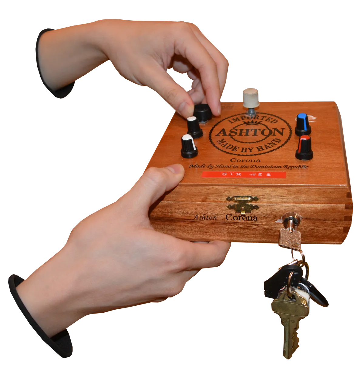 Hands adjusting knobs on a wooden electronic instrument